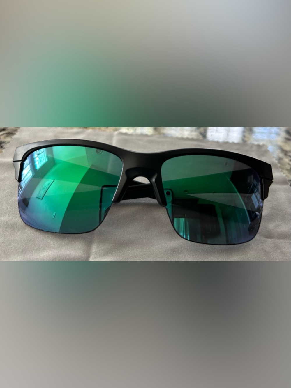 Oakley Matte Black Frame Sunglasses with Green Mirrored Lenses